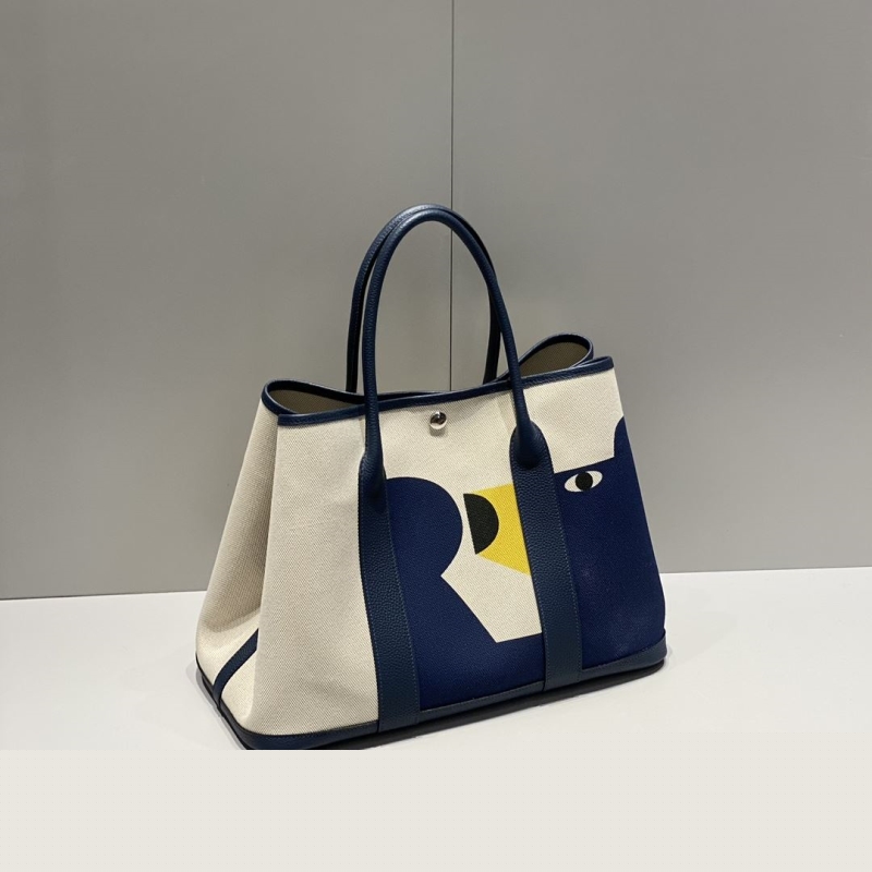 H**mes shopping bags